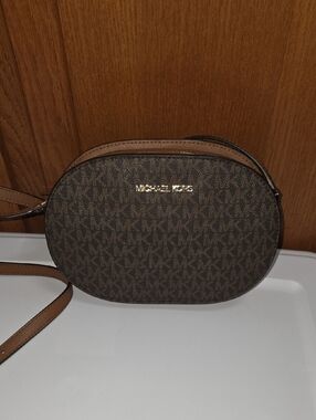 Michael Kors Brown Jet Set Oval Crossbody Bag